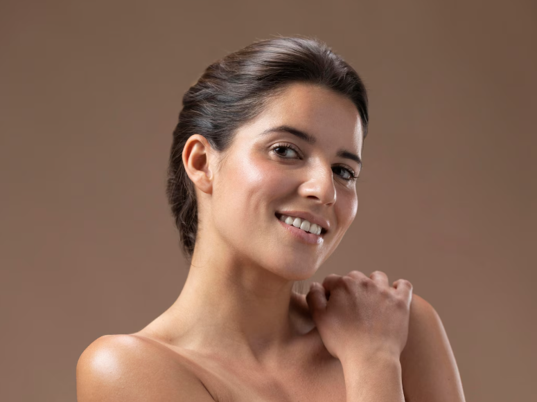 Woman with smooth, firm skin and a natural glow, representing youthful and healthy-looking skin.