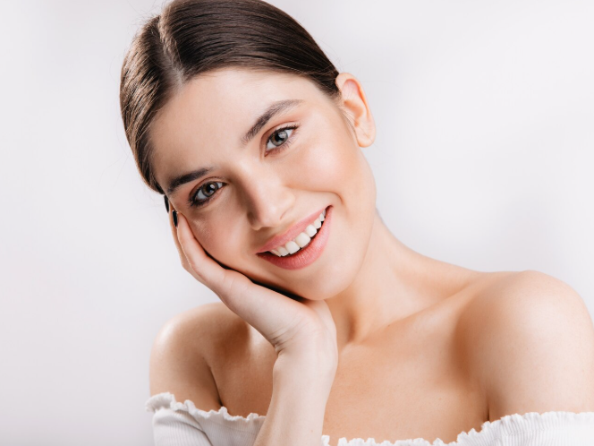 Woman with smooth, firm, and glowing skin, representing natural-looking results of HIFU skin tightening treatment.